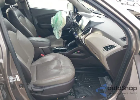 2012 Hyundai Tucson Limited z USA, uszkodzony, nr VIN KM8JU3AC1CU530974